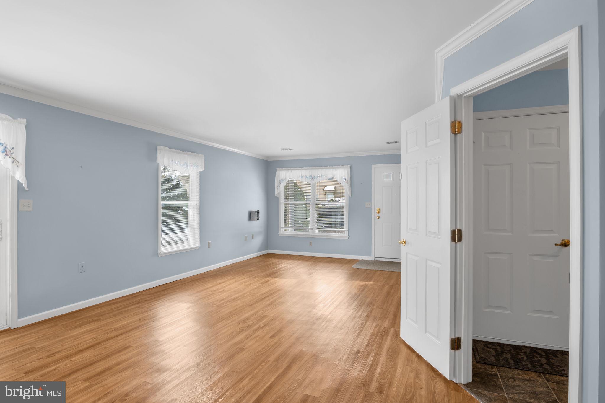 433 Mill Race Road Carlisle, PA 17013 - Photo 7 of 27 a view of livingroom with hardwood floor and hallway