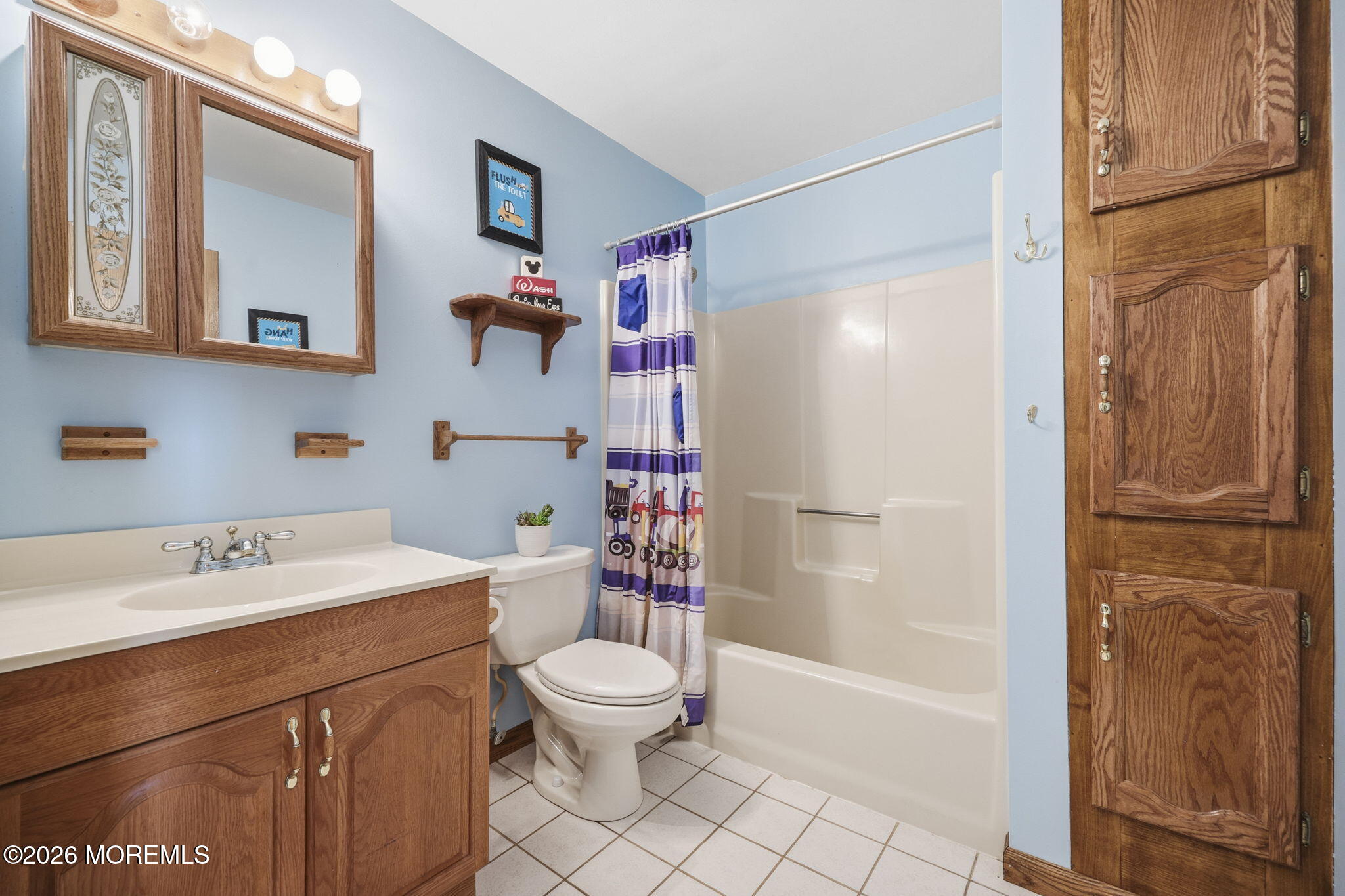 356 Leesville Road Jackson, NJ 08527 - Photo 26 of 46 a bathroom with a sink a toilet and shower