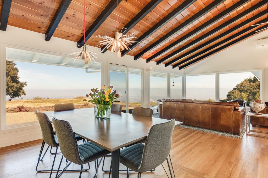 16984 Bohlman Road Saratoga, CA 95070 - Photo 11 of 50 a view of a dining room with furniture and wooden floor
