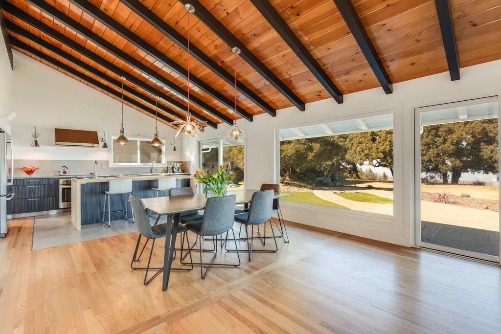 16984 Bohlman Road Saratoga, CA 95070 - Photo 13 of 50 a dining room with furniture and wooden floor