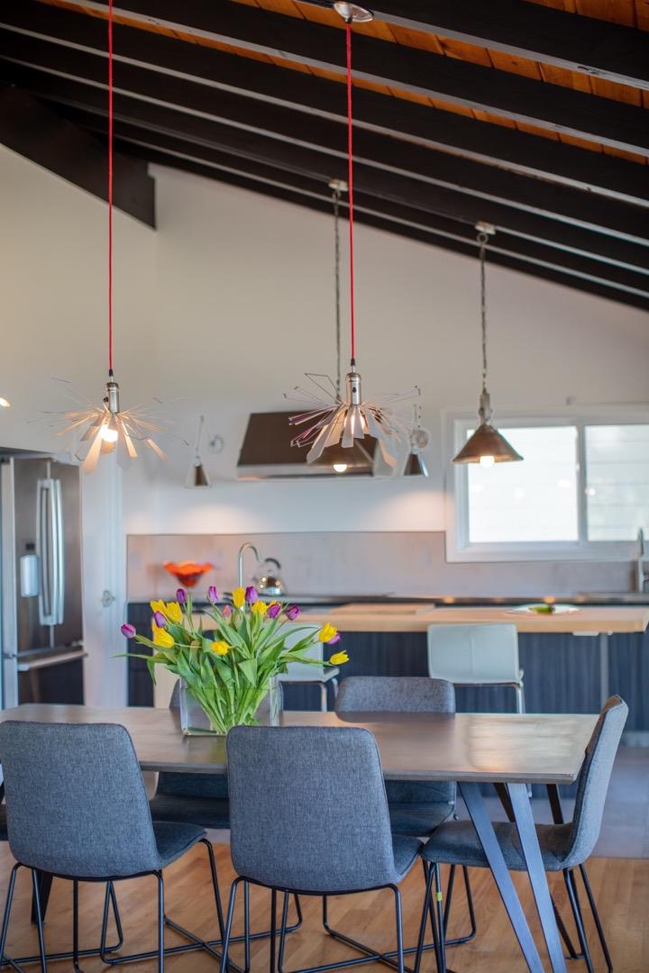 16984 Bohlman Road Saratoga, CA 95070 - Photo 25 of 50 a kitchen with a table and chairs in it