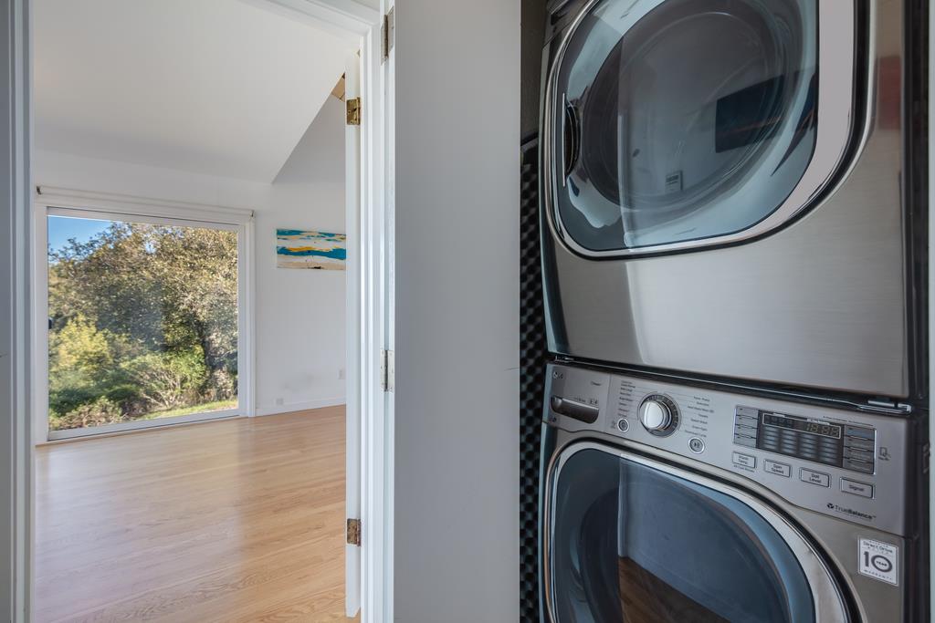 16984 Bohlman Road Saratoga, CA 95070 - Photo 40 of 50 a utility room with dryer and washer