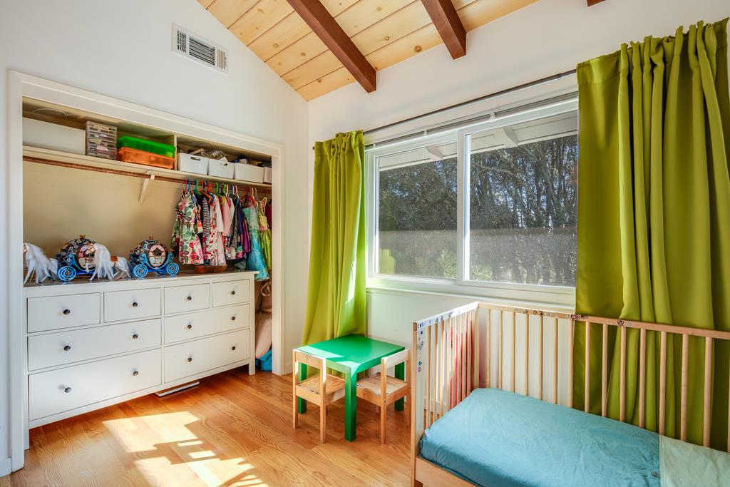 16984 Bohlman Road Saratoga, CA 95070 - Photo 42 of 50 a living room with furniture and a window