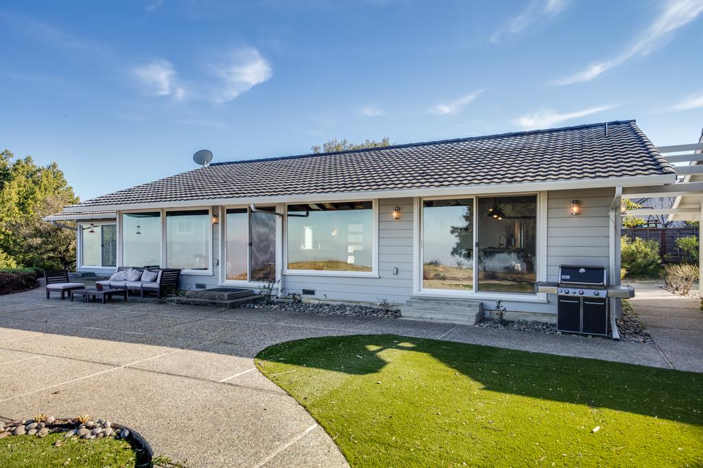 16984 Bohlman Road Saratoga, CA 95070 - Photo 47 of 50 a view of a house with swimming pool and sitting area