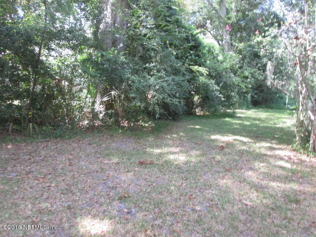 6252 Firestone Road Jacksonville, FL 32244 - Photo 12 of 12 a view of outdoor space with trees