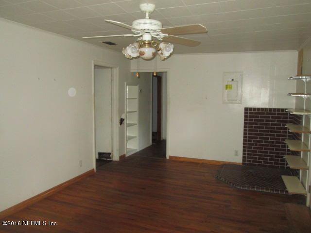 6252 Firestone Road Jacksonville, FL 32244 - Photo 3 of 12 wooden floor in an empty room