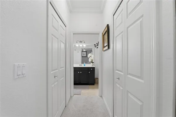 a bathroom with a sink vanity and a mirror