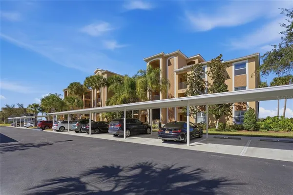 aerial view of a house with outdoor space and swimming pool