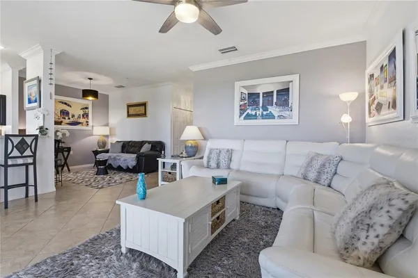 a living room with furniture and a window