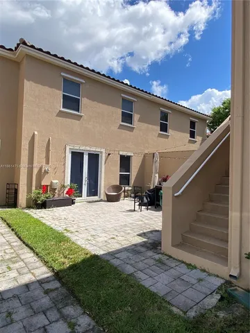 a view of a building with a garden