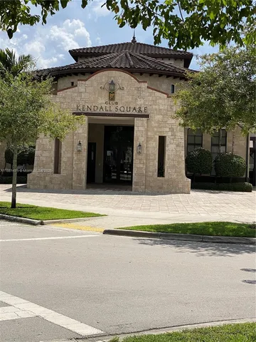 a building with trees in front of it