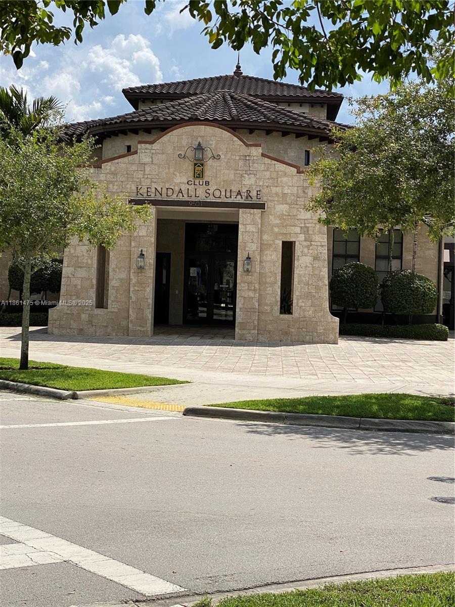17004 Southwest 95th Terrace Miami, FL 33196 - Photo 12 of 15 a view of a building with a garden