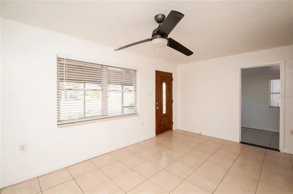 a view of an empty room and window