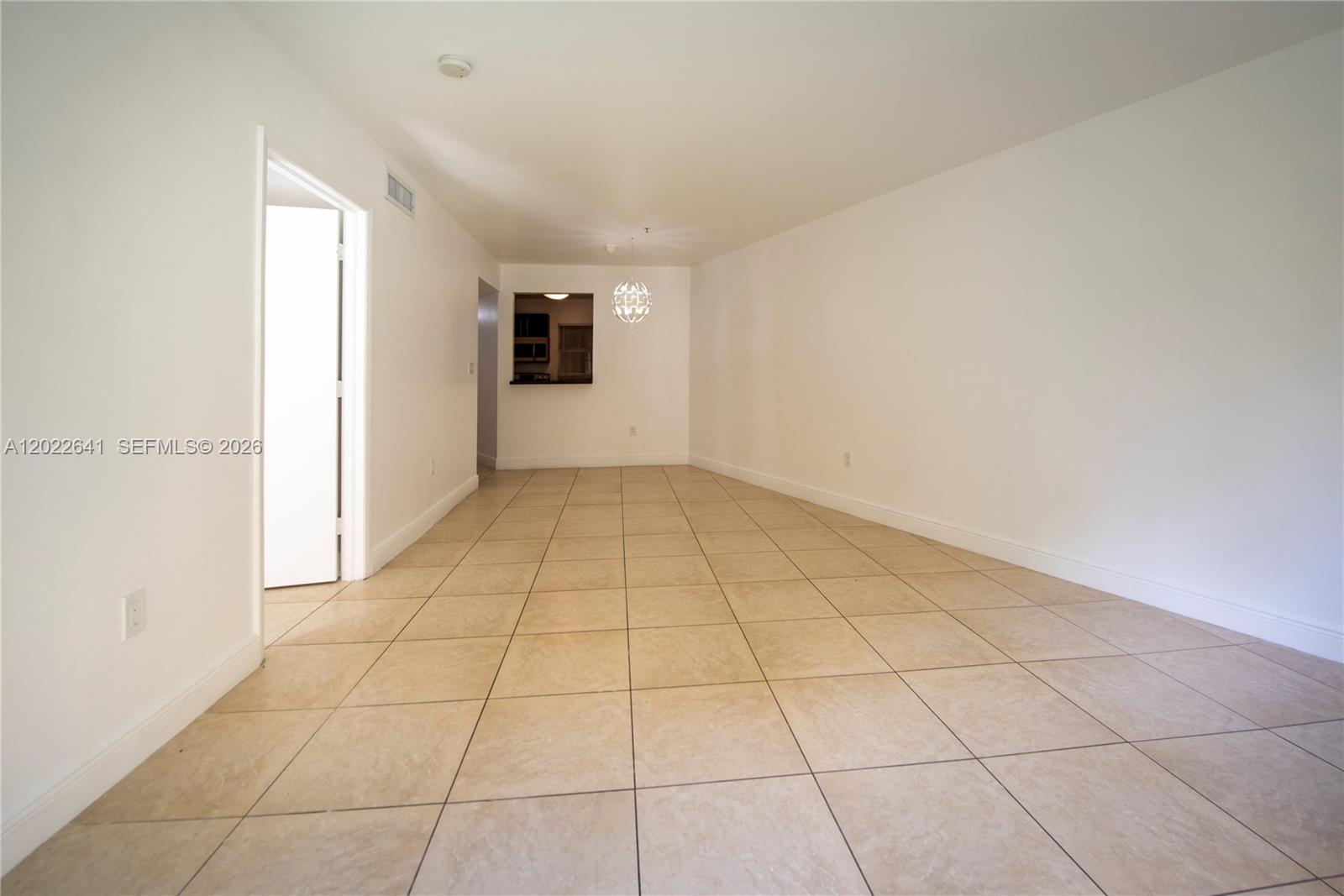 4147 Stirling Road, Unit 105 Dania Beach, FL 33314 - Photo 7 of 16 a view of an empty room and a window