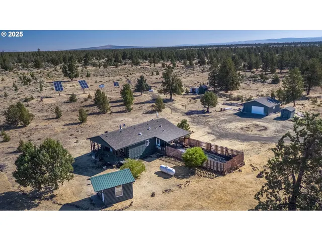 a black and white photo of a house