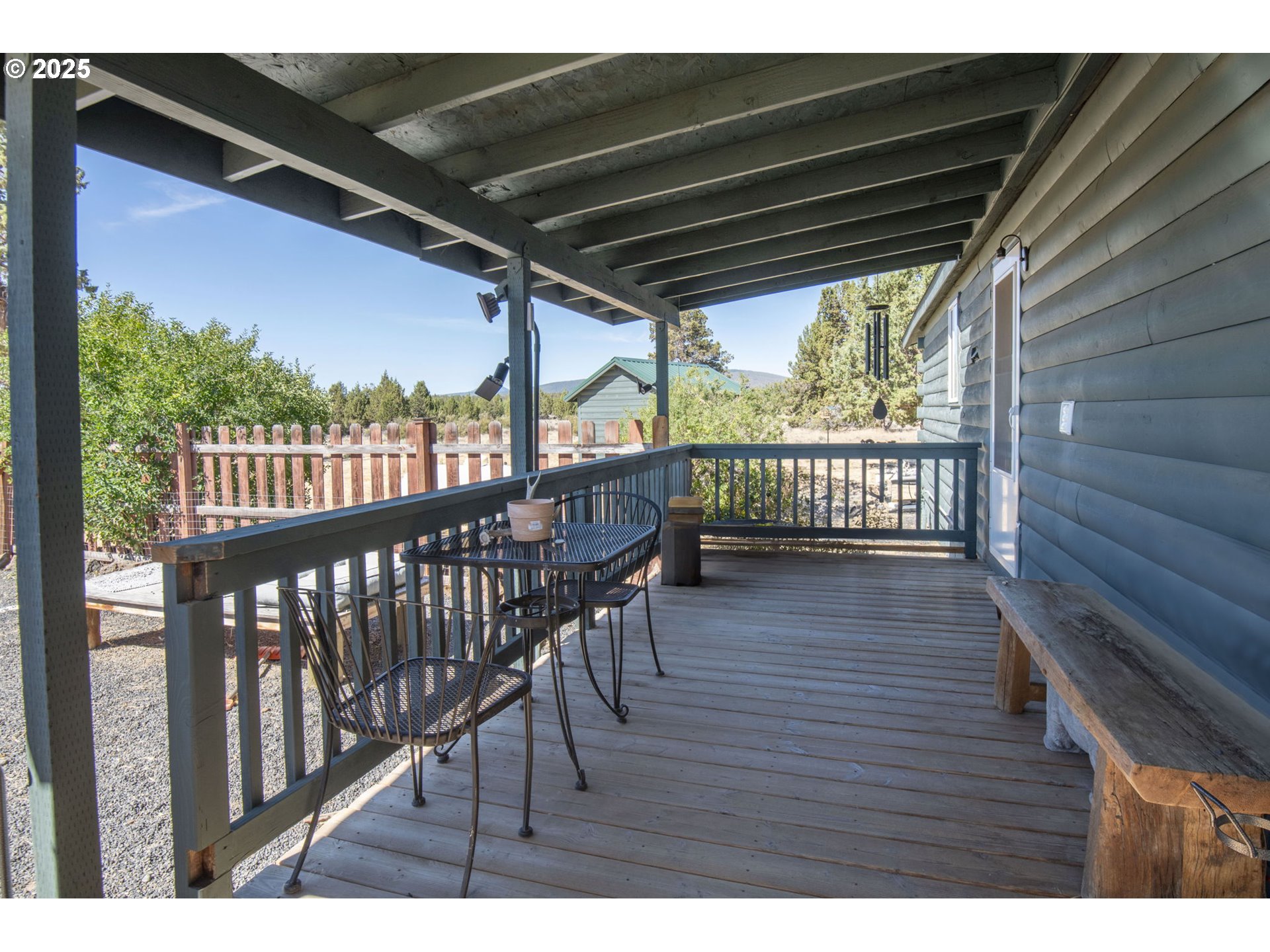 12510 Southwest Geneva Road Culver, OR 97734 - Photo 18 of 47 a view of a porch with wooden floor