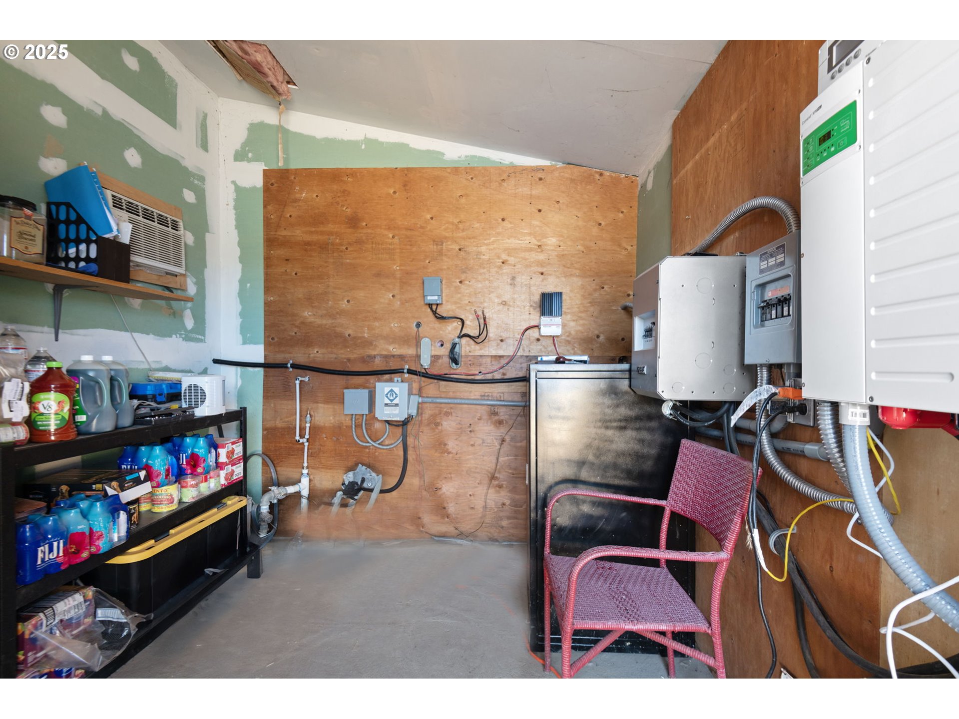 12510 Southwest Geneva Road Culver, OR 97734 - Photo 25 of 47 a living room with furniture and a floor to ceiling window