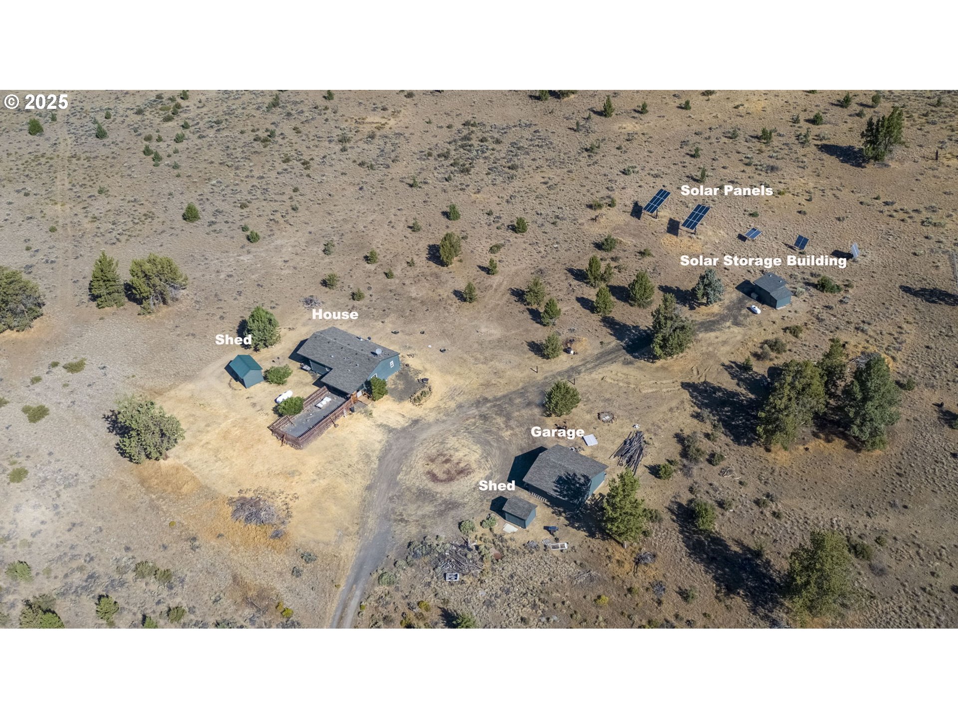 12510 Southwest Geneva Road Culver, OR 97734 - Photo 5 of 47 a black and white photo of a house