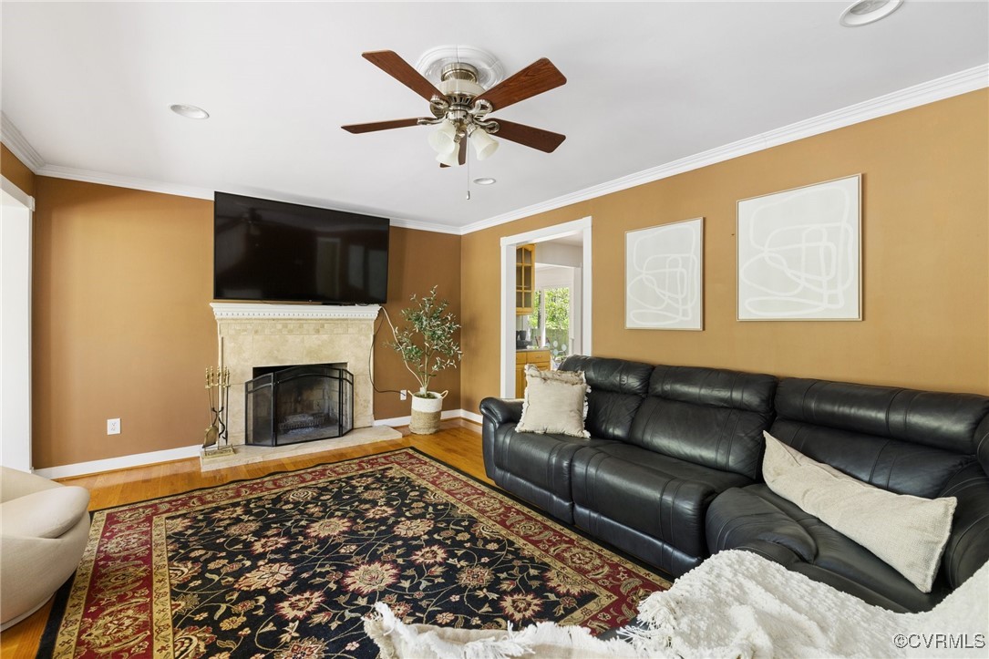 A beautiful space featuring hardwood floors, firep