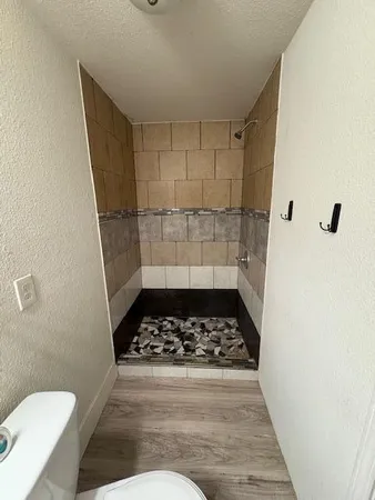 a bathroom with a sink and a toilet