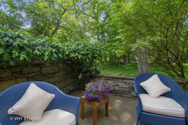a outdoor living space with furniture and garden view