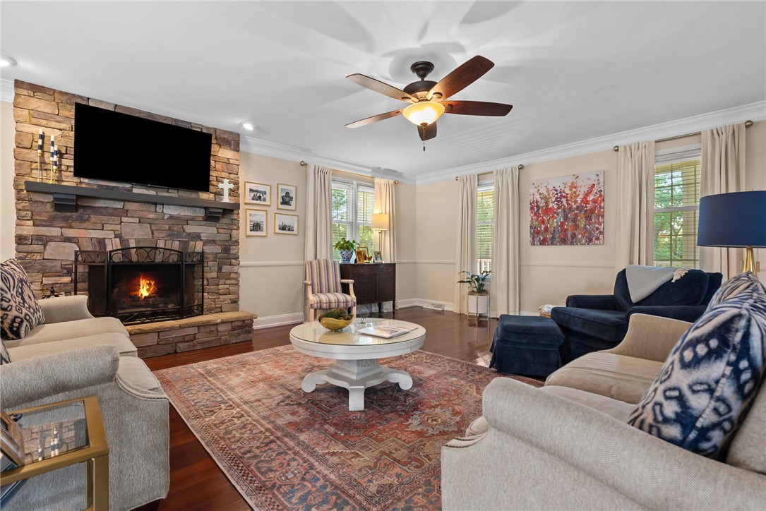 3513 Hopewell Road Anderson, SC 29621 - Photo 21 of 50 A striking stacked stone fireplace commands attention in this warm and welcoming living area.