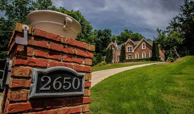a front view of house with garden