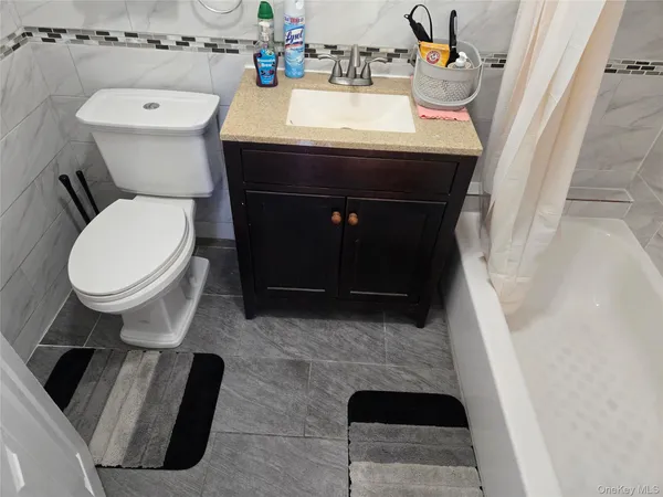 a bathroom with a sink and a toilet
