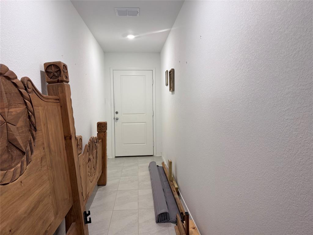 330 Ashbrook Way Princeton, TX 75407 - Photo 2 of 11 a view of a room with gym equipment