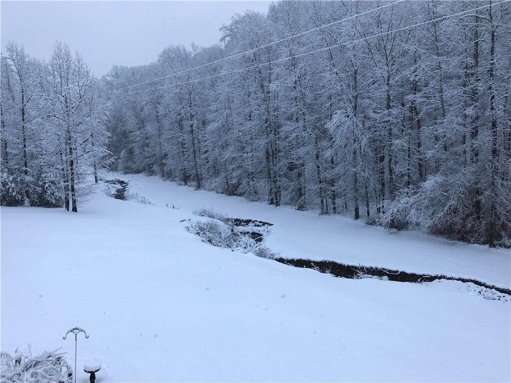 511 Fontaine Road Southwest Mableton, GA 30126 - Photo 3 of 11 a view of a dry yard with a barn in the background