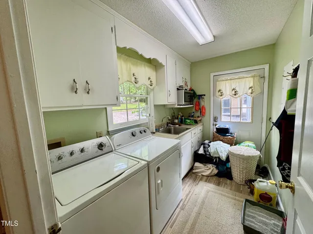 a room with a bed furniture and a window