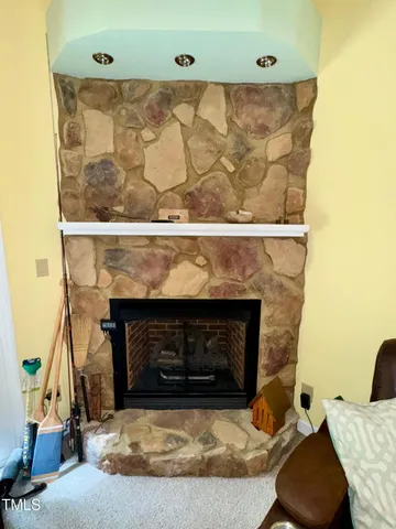 a living room with a fireplace