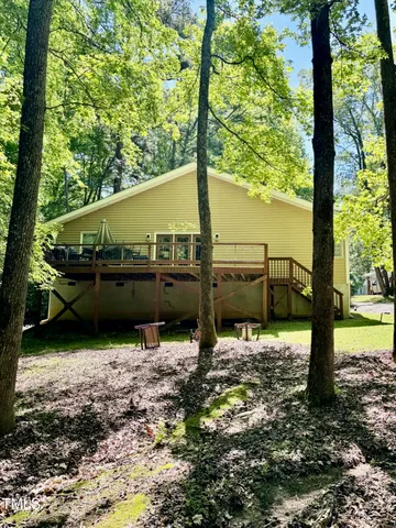 a backyard of a house with lots of green space