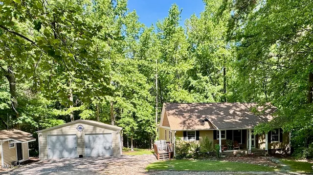 a view of a house with a garden
