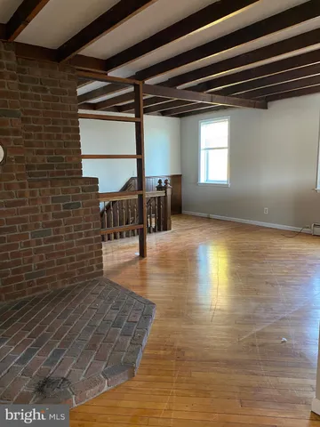 a view of livingroom with hardwood floor and window