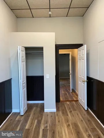 a view of a utility room with closet