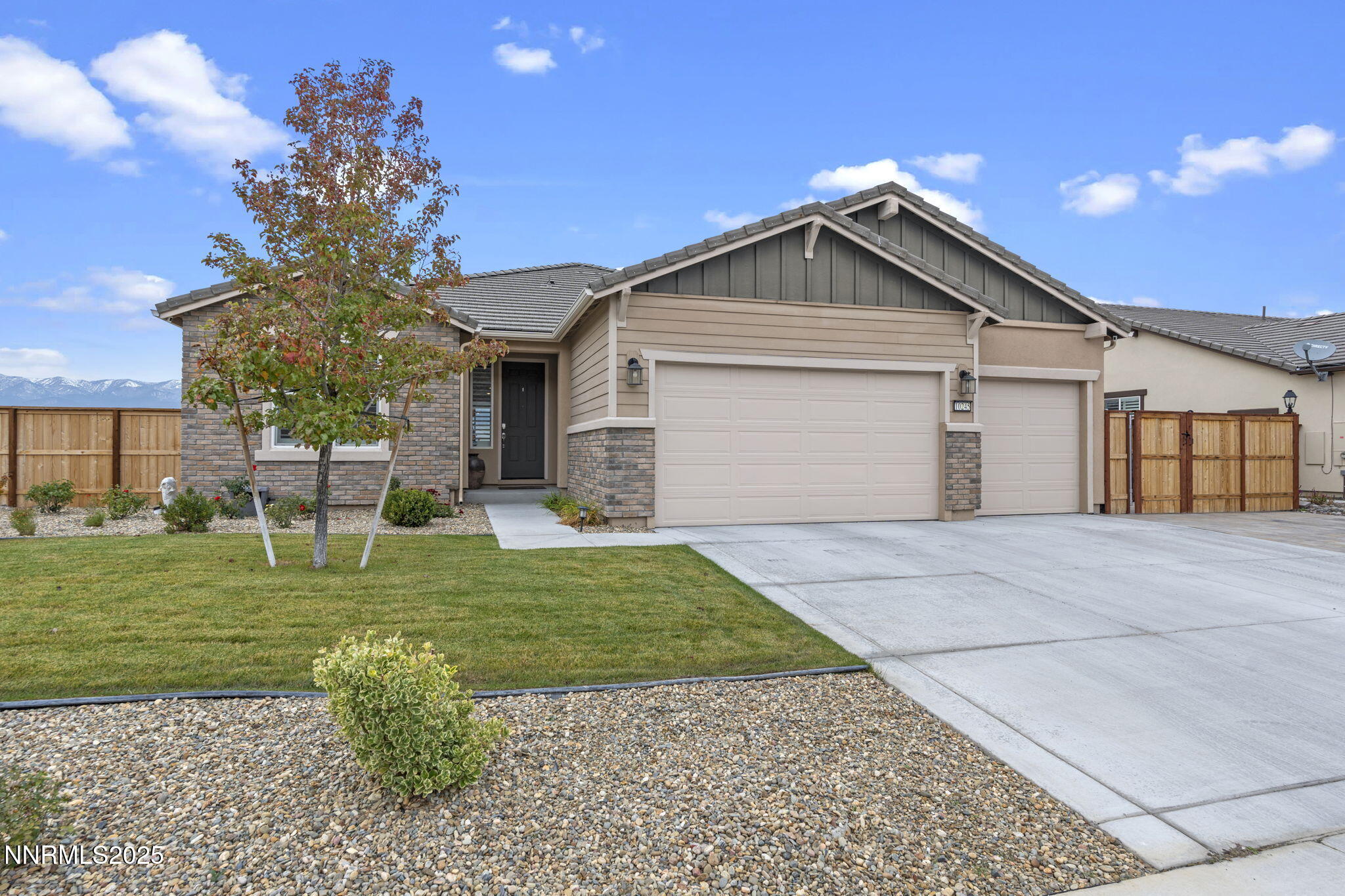 10245 Mother Lode Drive Reno, NV 89521 - Photo 67 of 67 a front view of a house with a yard