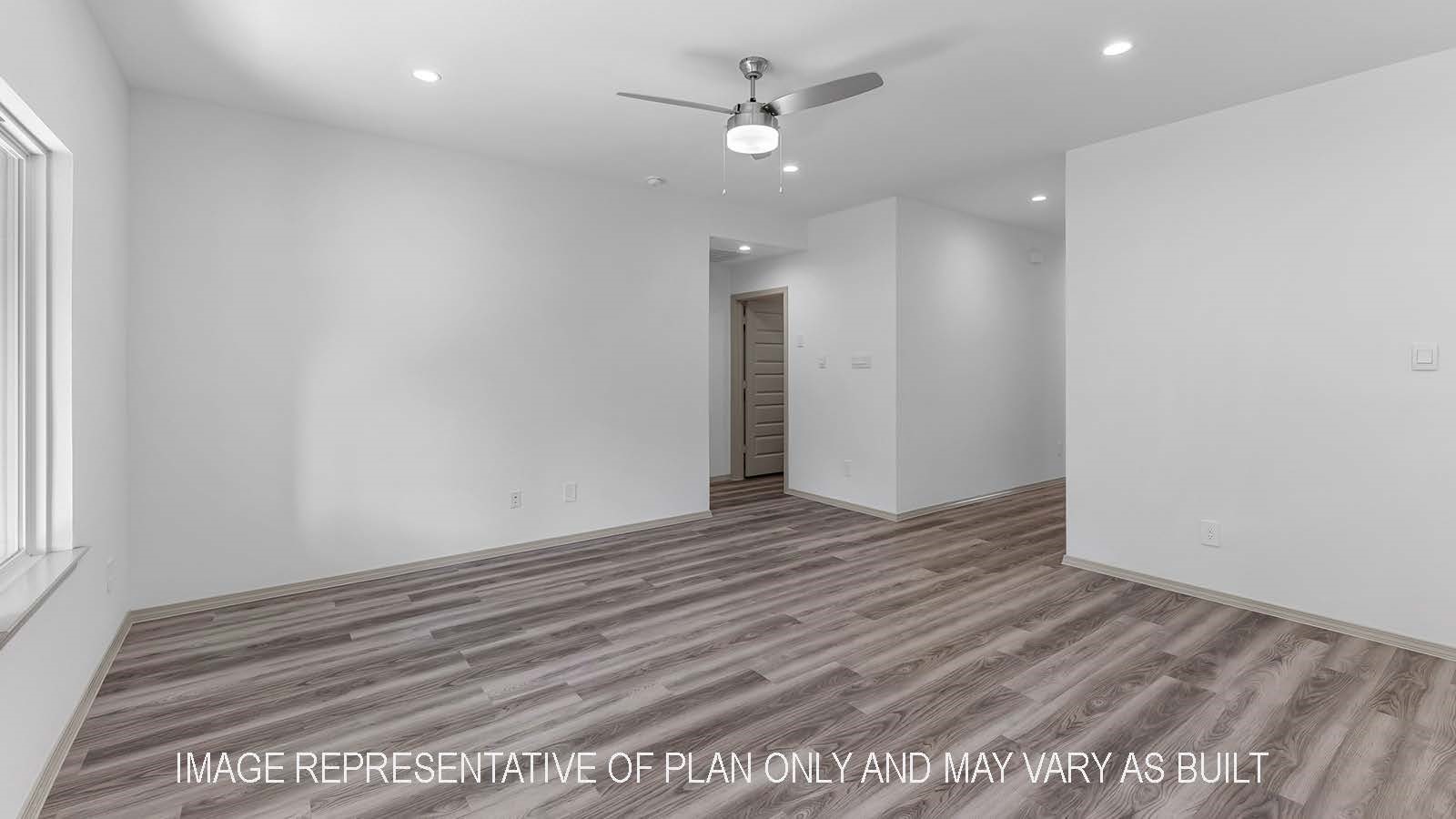 5695 Spoonbill Lane Orange, TX 77632 - Photo 11 of 22 wooden floor in an empty room with a window