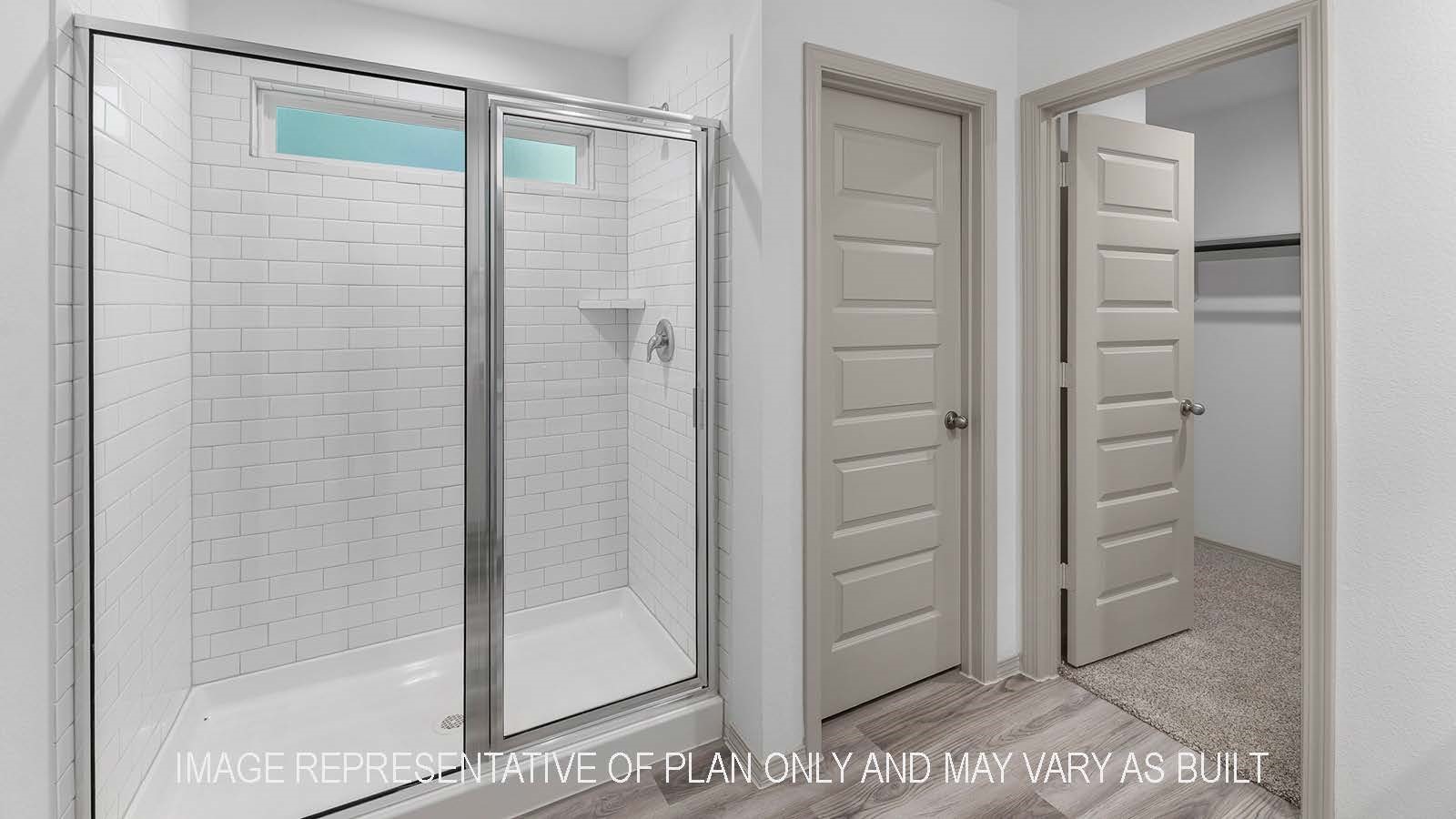 5695 Spoonbill Lane Orange, TX 77632 - Photo 16 of 22 a bathroom with a glass shower door