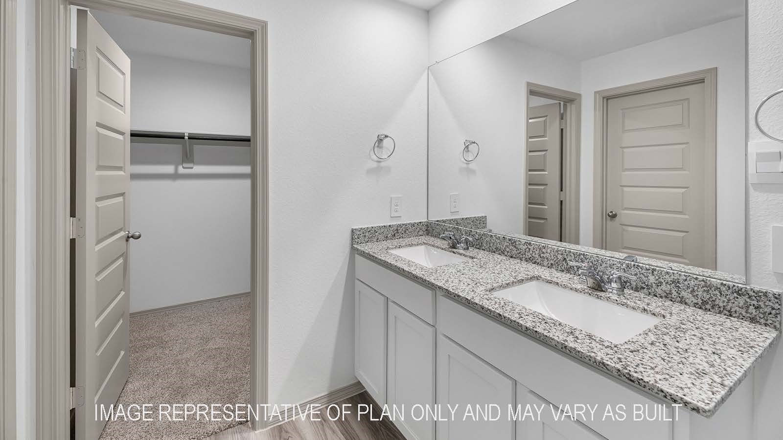 5695 Spoonbill Lane Orange, TX 77632 - Photo 17 of 22 a bathroom with a granite countertop sink and a mirror