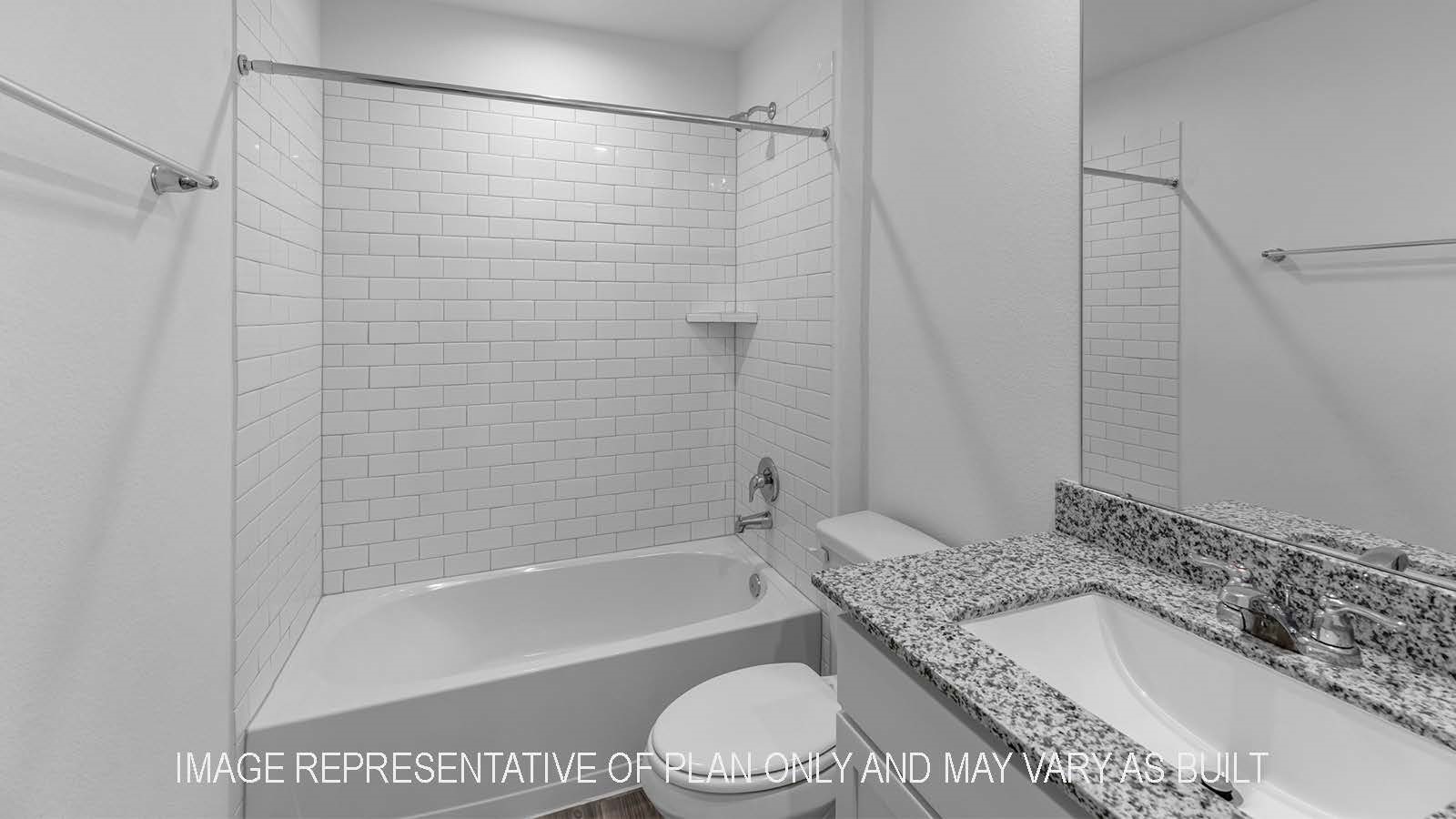 5695 Spoonbill Lane Orange, TX 77632 - Photo 22 of 22 a bathroom with a granite countertop bathtub shower sink vanity and toilet