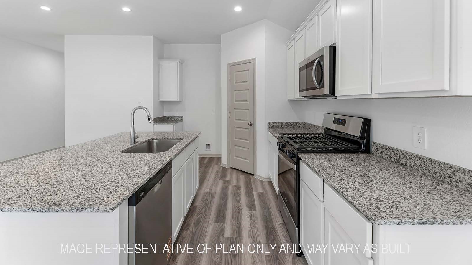 5695 Spoonbill Lane Orange, TX 77632 - Photo 7 of 22 a kitchen with kitchen island granite countertop a sink a counter top space stainless steel appliances and cabinets