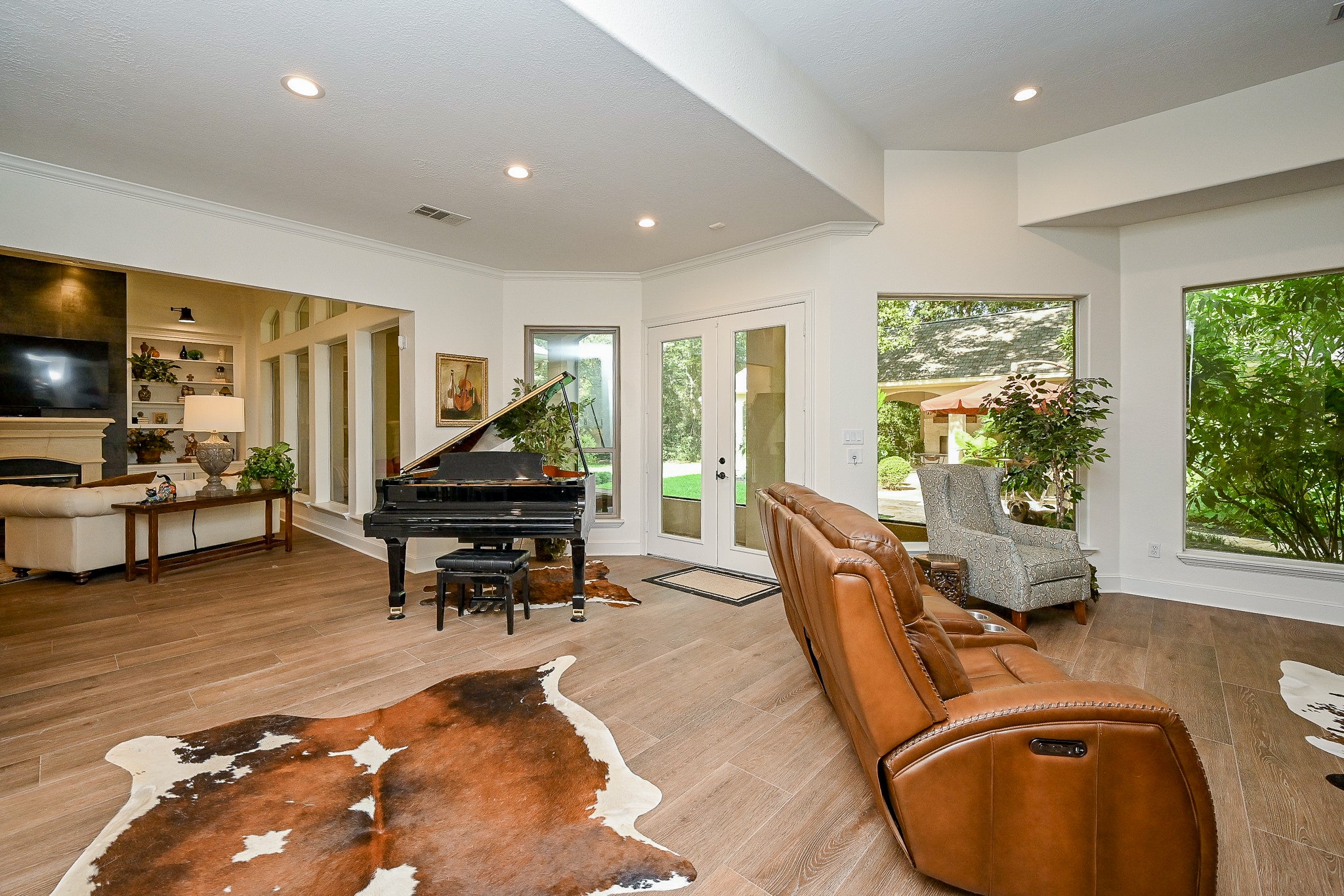 23914 Clouds Rest Magnolia, TX 77355 - Photo 17 of 50 a living room with furniture and a flat screen tv