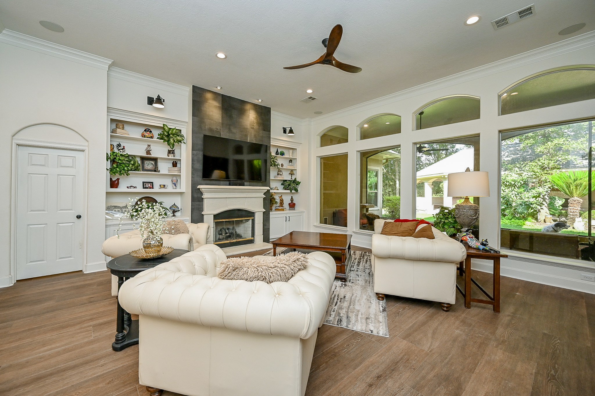 23914 Clouds Rest Magnolia, TX 77355 - Photo 18 of 50 a living room with fireplace furniture and a flat screen tv