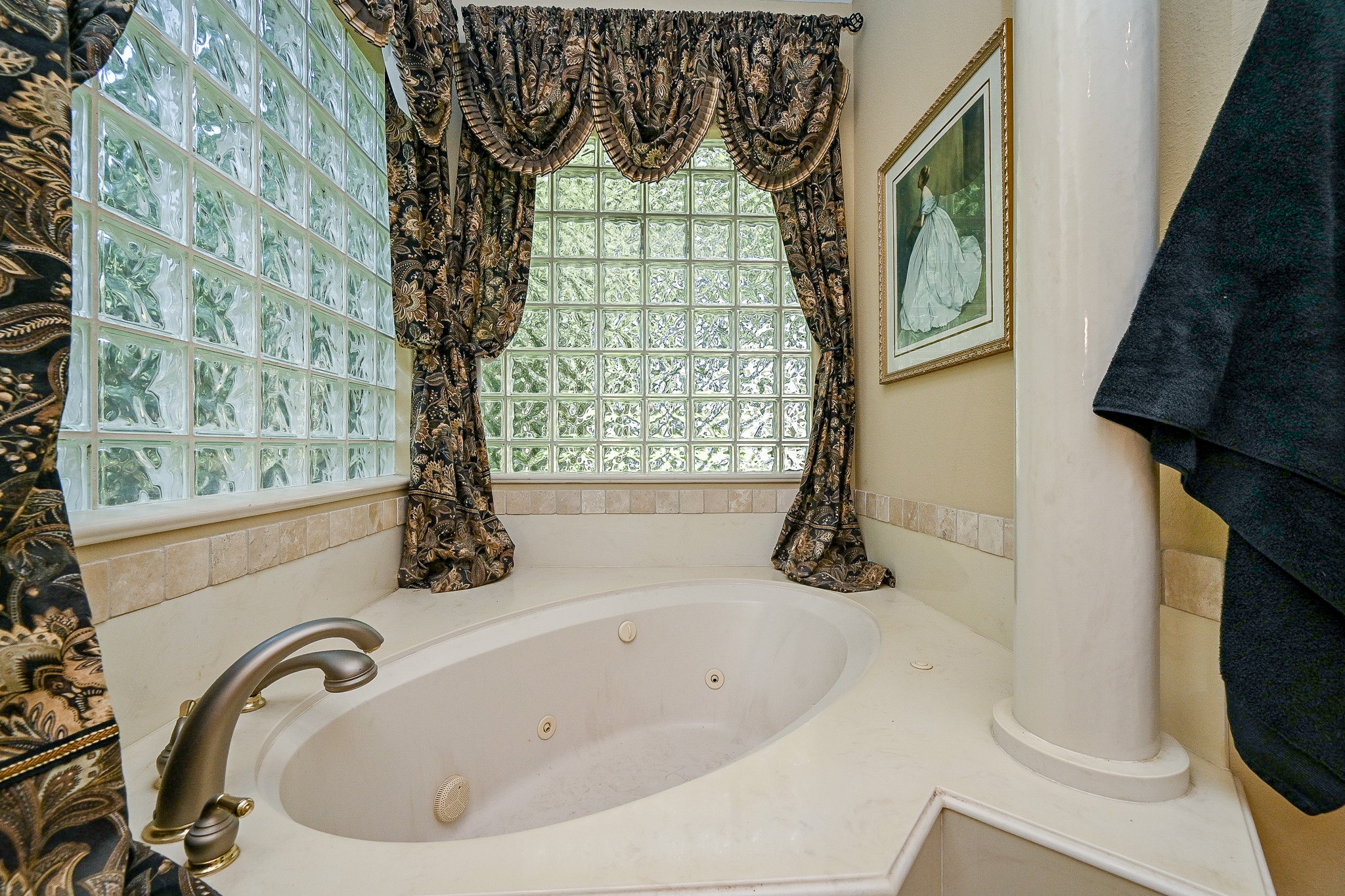 23914 Clouds Rest Magnolia, TX 77355 - Photo 28 of 50 a bathroom with a bathtub sink and window
