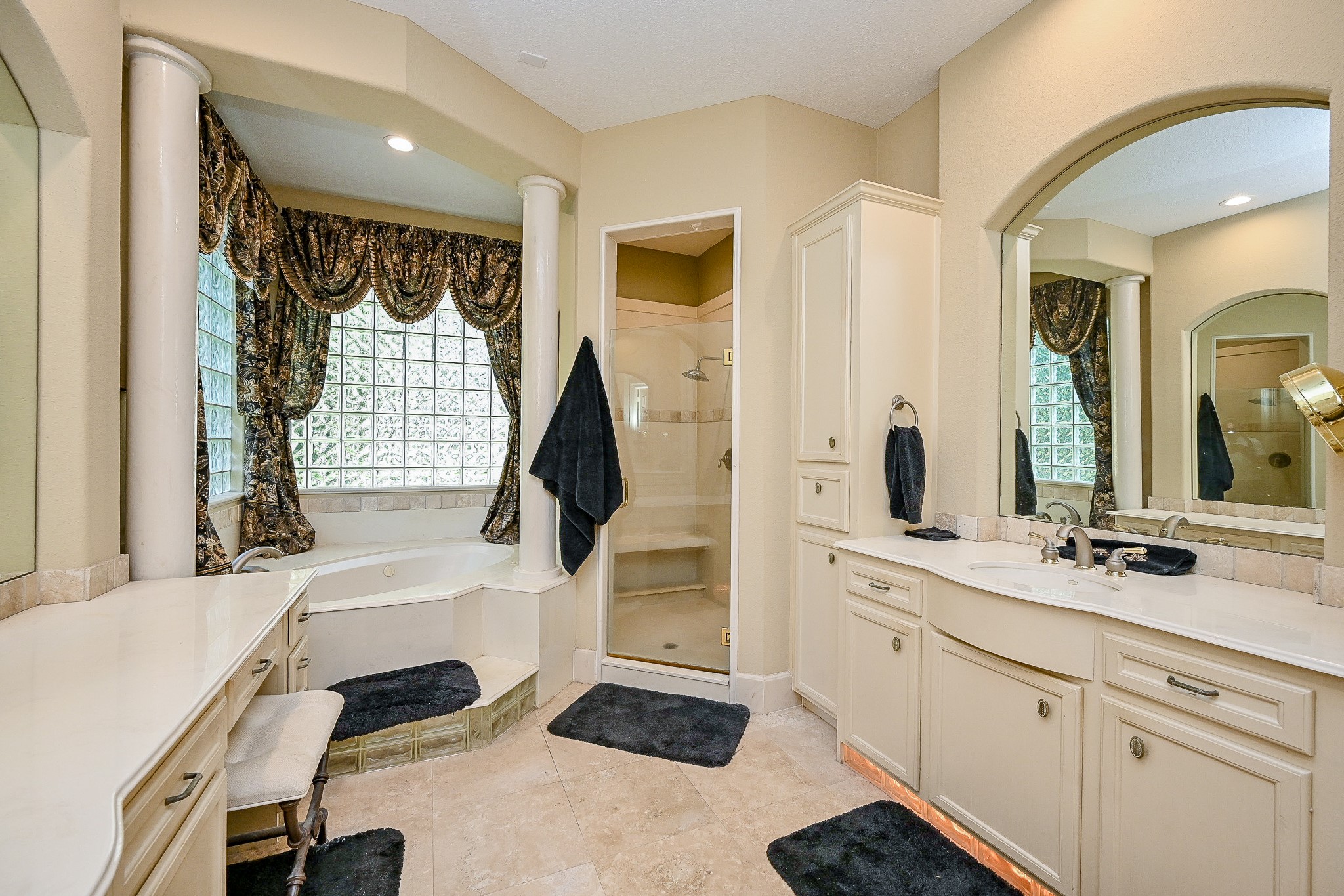 23914 Clouds Rest Magnolia, TX 77355 - Photo 29 of 50 a bathroom with a sink a mirror and a bathtub