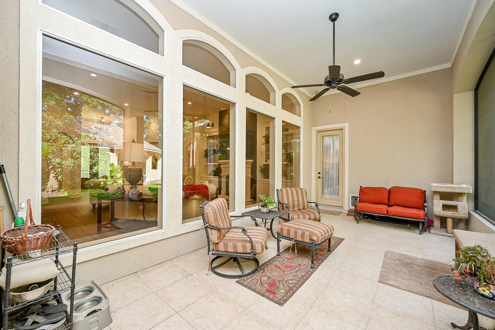 23914 Clouds Rest Magnolia, TX 77355 - Photo 31 of 50 a living room with furniture and a chandelier