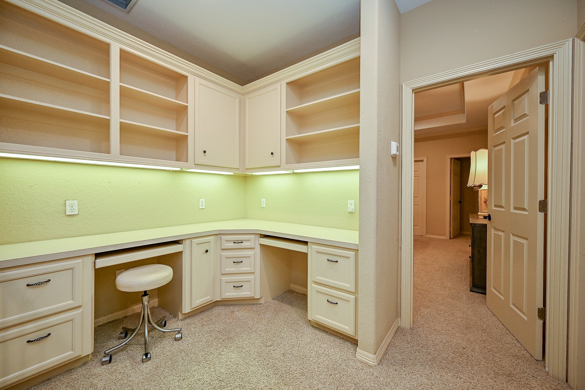 23914 Clouds Rest Magnolia, TX 77355 - Photo 36 of 50 a kitchen with white cabinets and chair