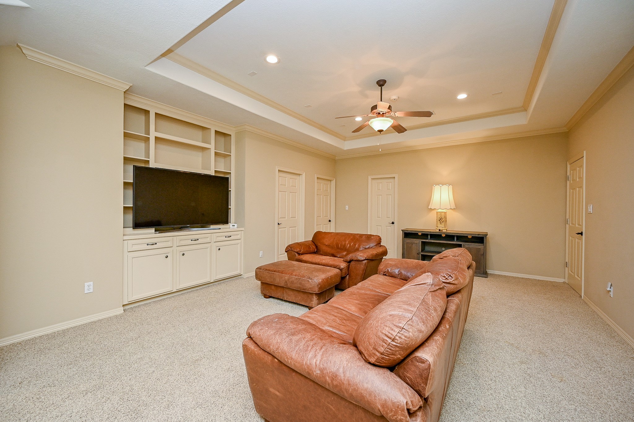 23914 Clouds Rest Magnolia, TX 77355 - Photo 40 of 50 a living room with furniture and a flat screen tv