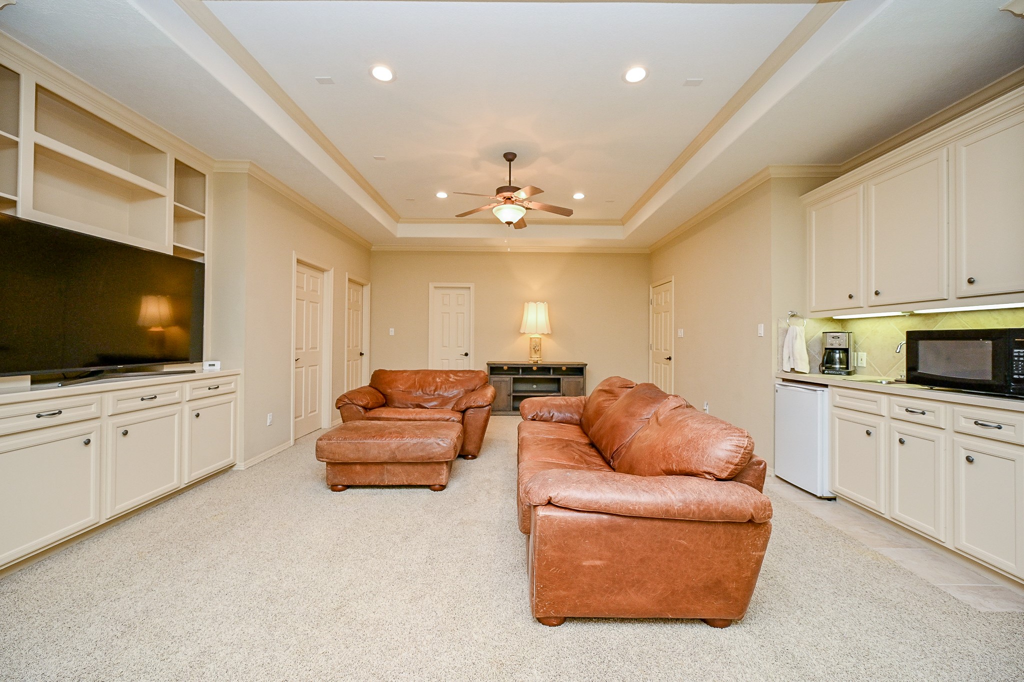 23914 Clouds Rest Magnolia, TX 77355 - Photo 41 of 50 a living room with furniture and a flat screen tv
